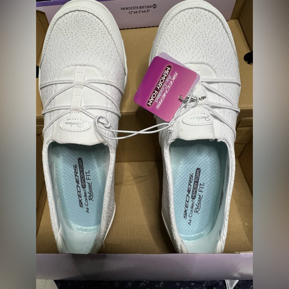 Skechers Women's White Slip on shoes